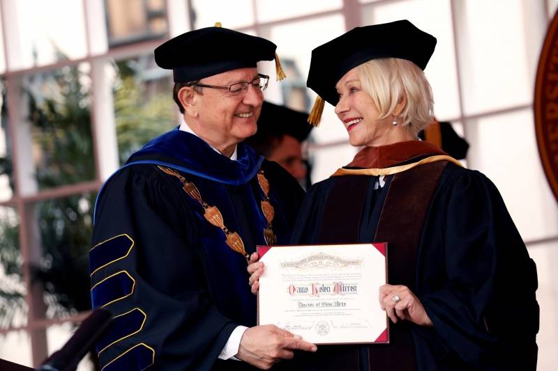 Actor Helen Mirren receives an honorary degree from USC President C. L. Max Nikias during the commencement ceremony at the University of Southern California (USC) in Los Angeles