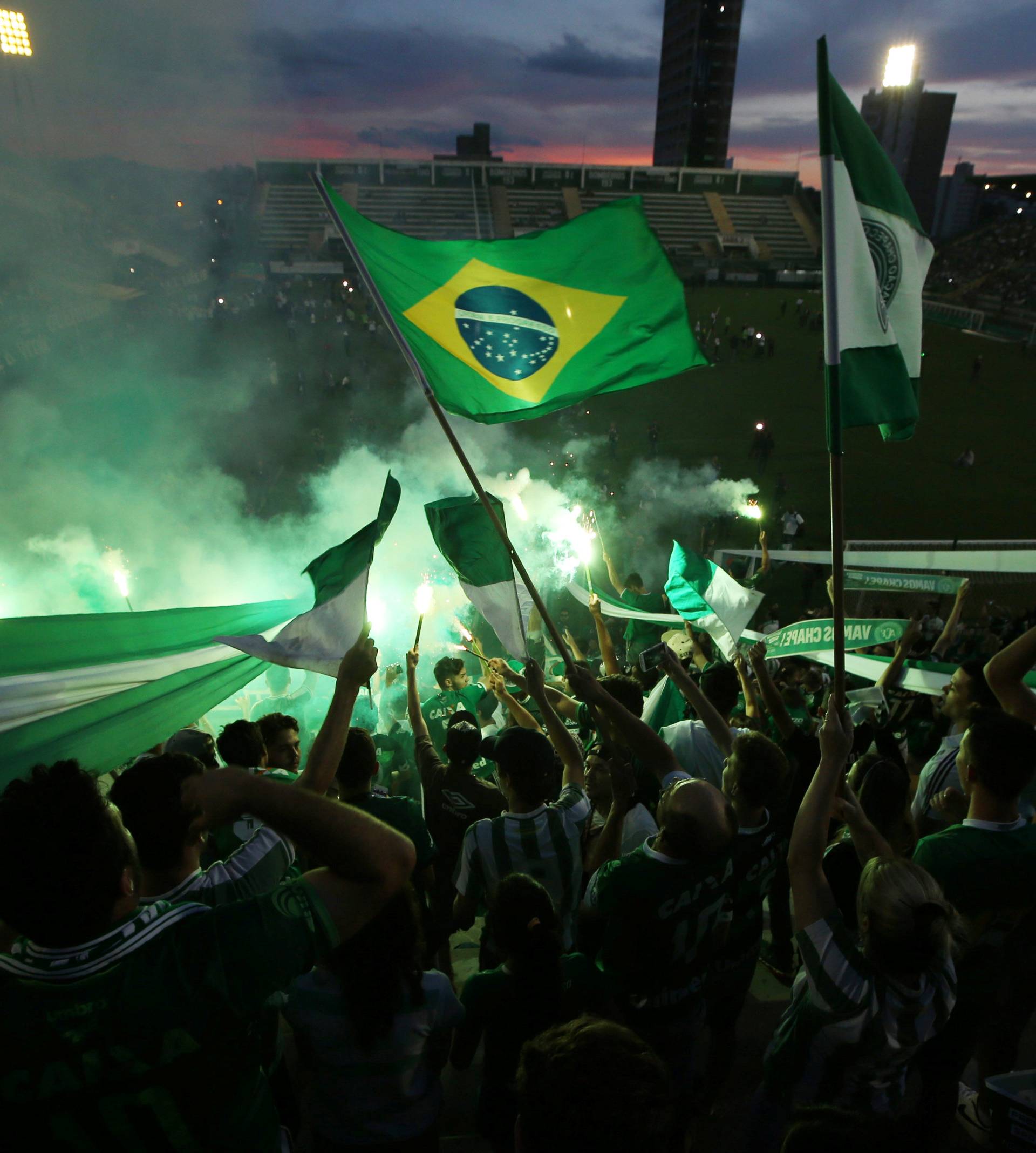 Fans of Chapecoense soccer team pay tribute to Chapecoense's players at the Arena Conda stadium in Chapeco