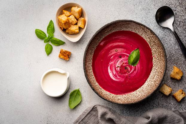 Beetroot,Cream,Soup,With,Coconut,Milk,And,Croutons,On,A