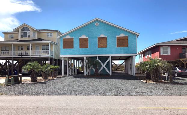 Boarded up houses are seen ahead of Hurricane FlorenceÃs expected landfall at Holden Beach