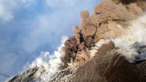 Italy's Mount Etna erupts
