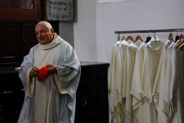 Cardinal Jean Marc Aveline reacts after a Sunday Mass in Santa Maria ai Monti church, in Rome