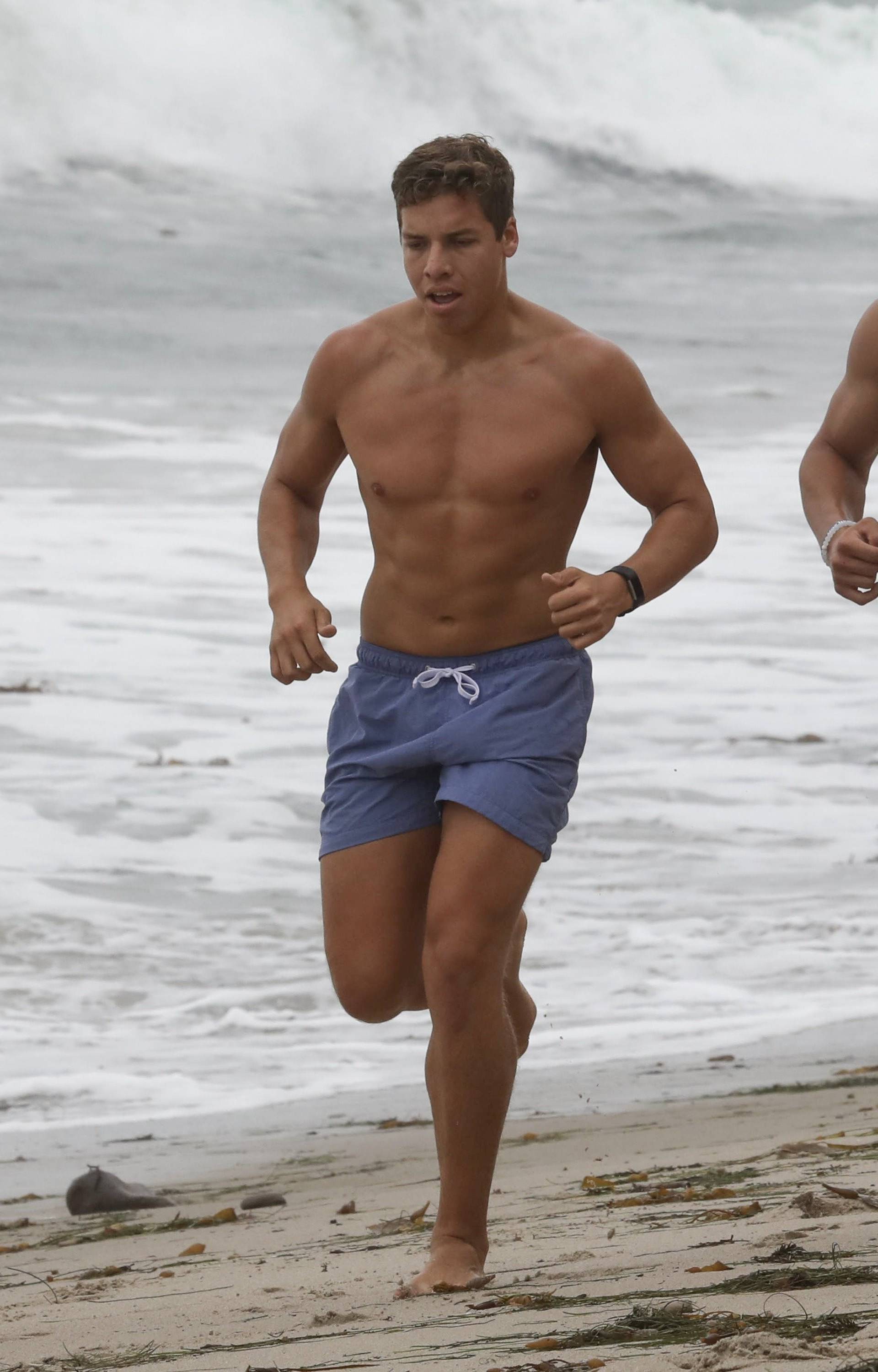 *EXCLUSIVE* Joseph Baena shows off his toned bod on a jog with friends