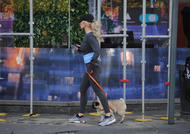 Milan, Helena Seger goes shopping at Hermes in via Monte Napoleone with her dog