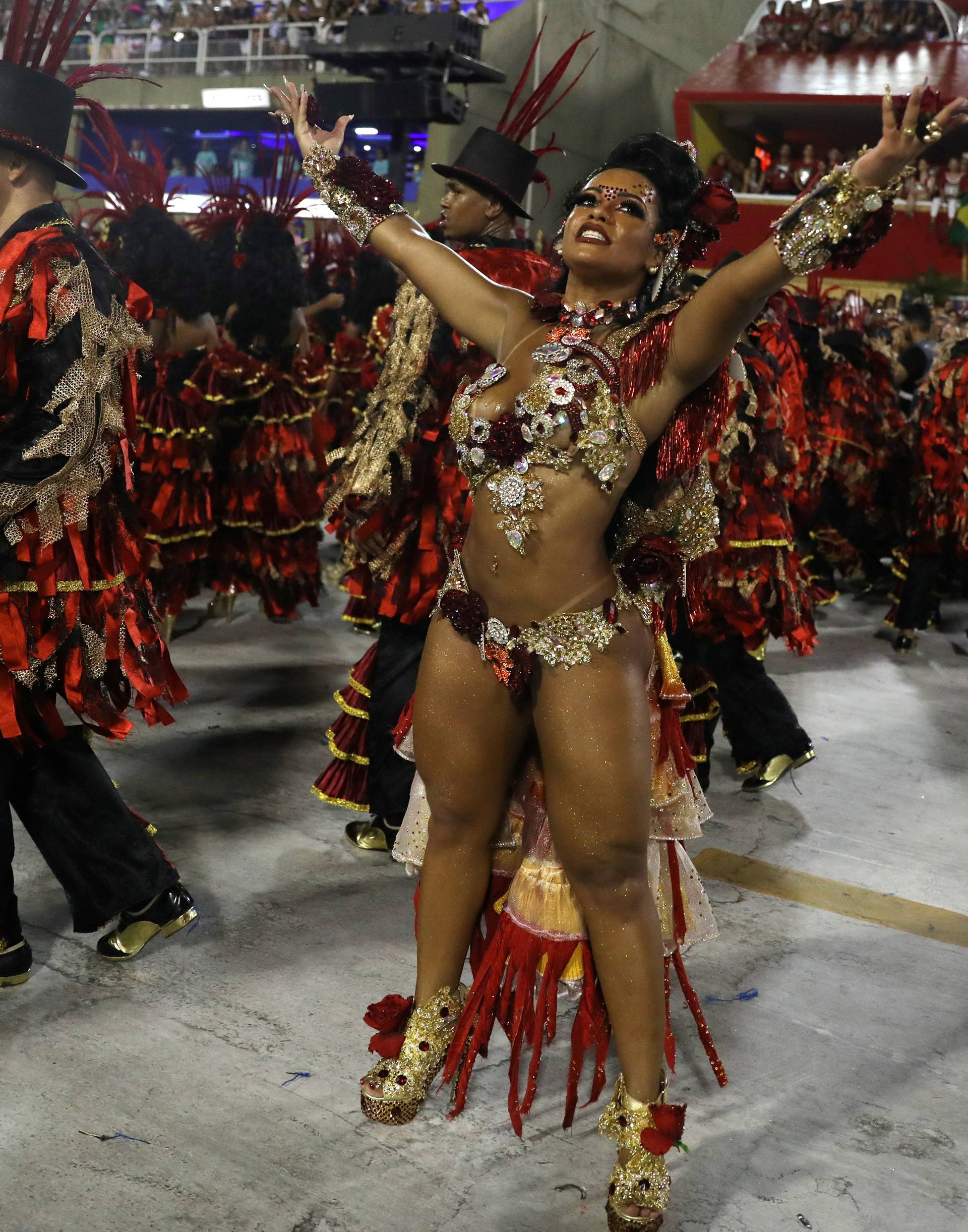 Drum queen Raissa de Oliveira from Beija-Flor samba school performs during the second night of the Carnival parade at the Sambadrome in Rio de Janeiro