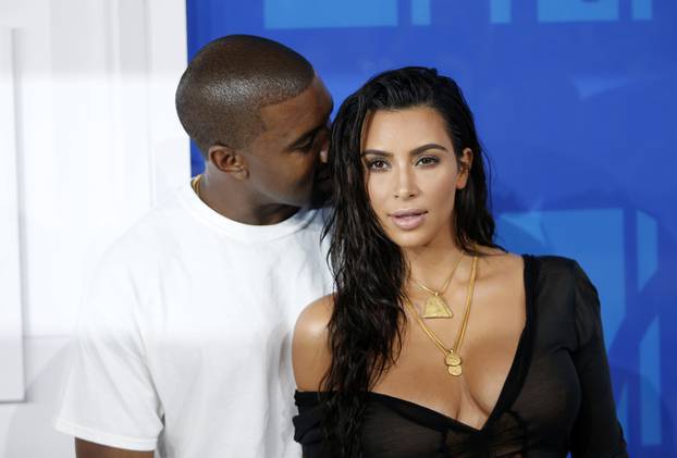 Kim Kardashian and Kanye West arrive at the 2016 MTV Video Music Awards in New York