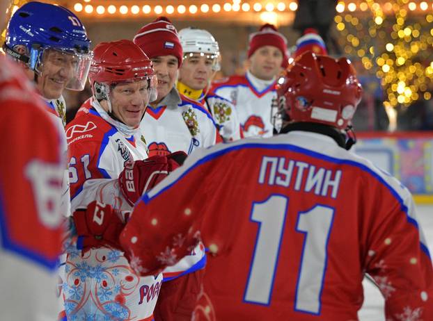 Russian President Putin plays ice hockey in Moscow