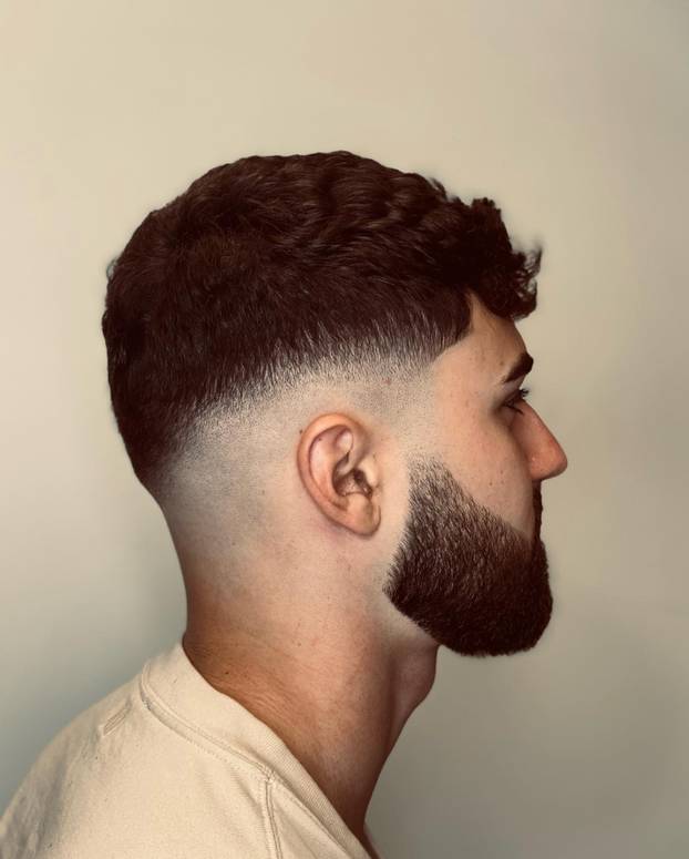 FOTO Tko je brijač 'vatrenih'? Uspio je nagovoriti Modrića na promjenu: 'Perišić? Boljelo me'