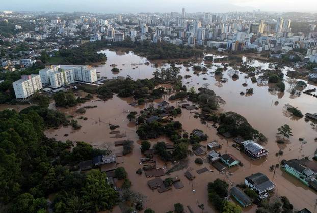 Houses are seen in a flooded area after an extratropical cyclone hit southern cities, in Lajeado