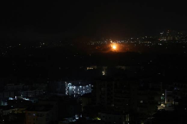 Smoke rises after Israeli strikes on Beirut's southern suburbs, following an escalation between Hezbollah and Israel amid the U.S.-Israeli conflict with Iran