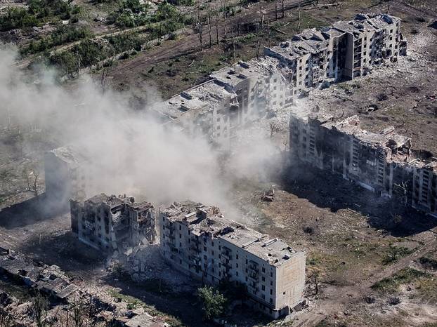 A drone view shows destroyed buildings in the frontline town of Chasiv Yar