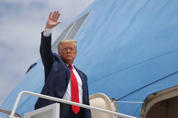 Trump boards Air Force One to travel to Florida to observe the launch of a SpaceX Crew Dragon spacecraft, from Joint Base Andrews, Maryland