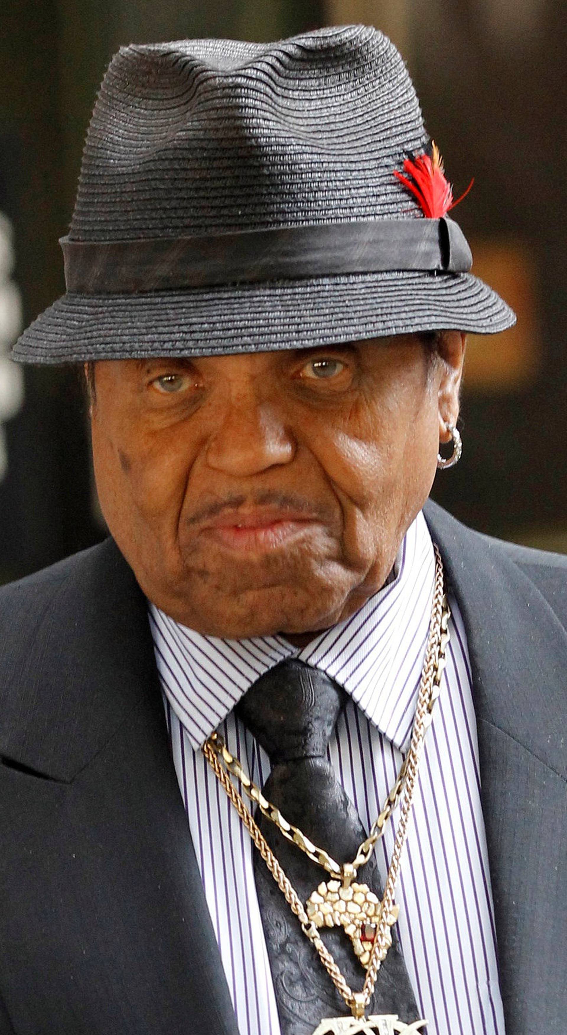 FILE PHOTO: Joe Jackson father of the late pop star Michael Jackson leaves the courthouse during Dr. Conrad Murray's trial in the death of his son in Los Angeles