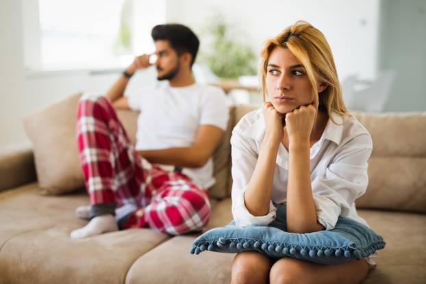 Unhappy couple having crisis and difficulties in relationship