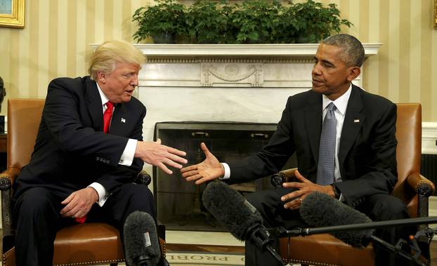 U.S. President Barack Obama meets with President-elect Donald Trump in the Oval Office of the White House in Washington