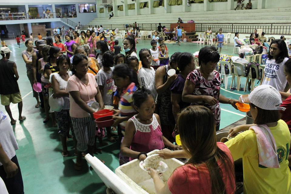 Photo by LGU Gonzaga Cagayan from social media shows people inside an evacuation centre in preparation for Typhoon Mangkhut in Cagayan