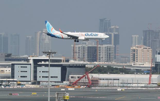 FILE PHOTO: A Fly Dubai Boeing 737-800 airliner prepares to land at Dubai International Airport