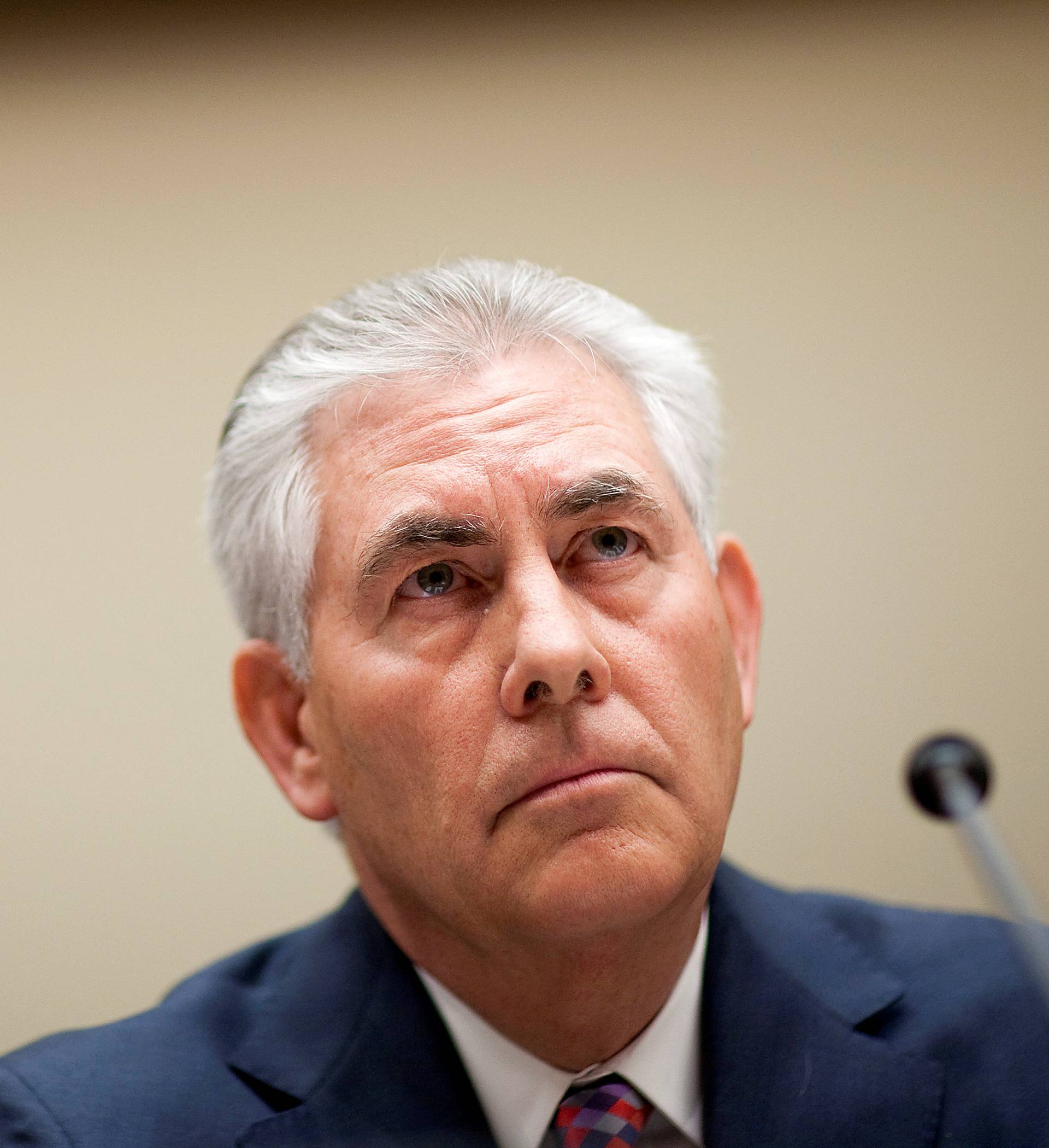 Tillerson, chairman and CEO of ExxonMobil, testifies about the company's acquisition of XTO Energy before the House Energy and Environment Subcommittee on Capitol Hill in Washington