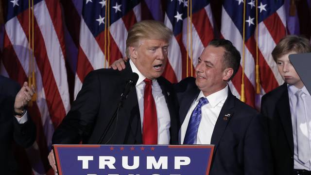 Donald Trump and Reince Priebus address supporters during his election night rally in New York