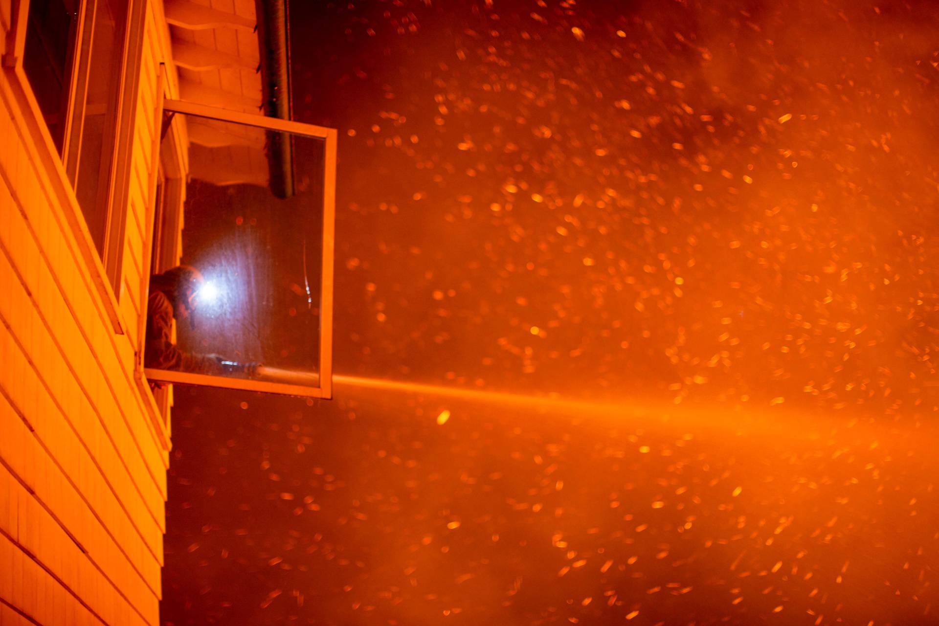 Palisades fire burns during a windstorm on the west side of Los Angeles