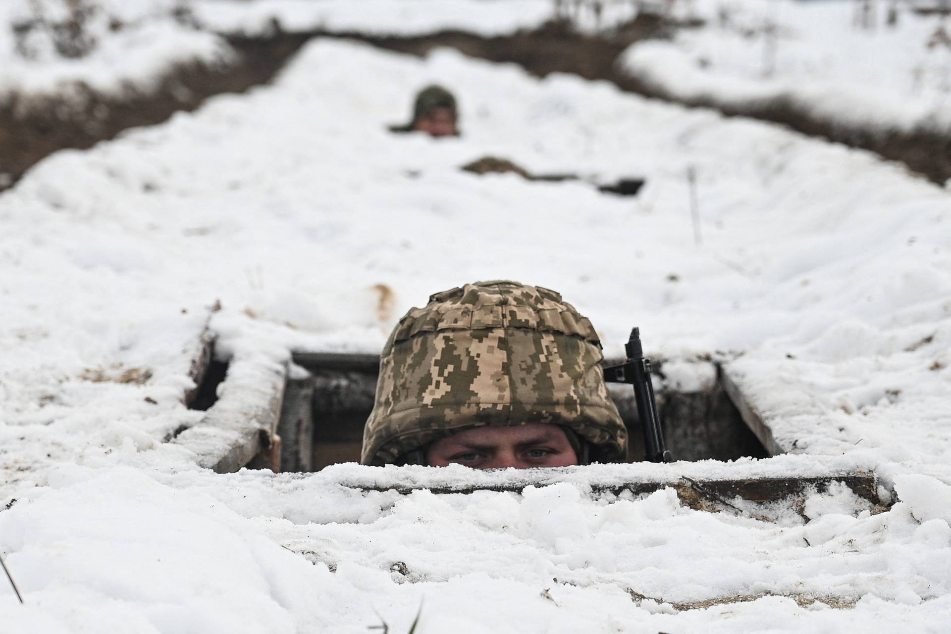 Ukrainian service members attend military exercises in Chernihiv region