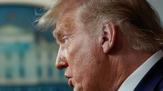 U.S. President Trump speaks to reporters during a news conference