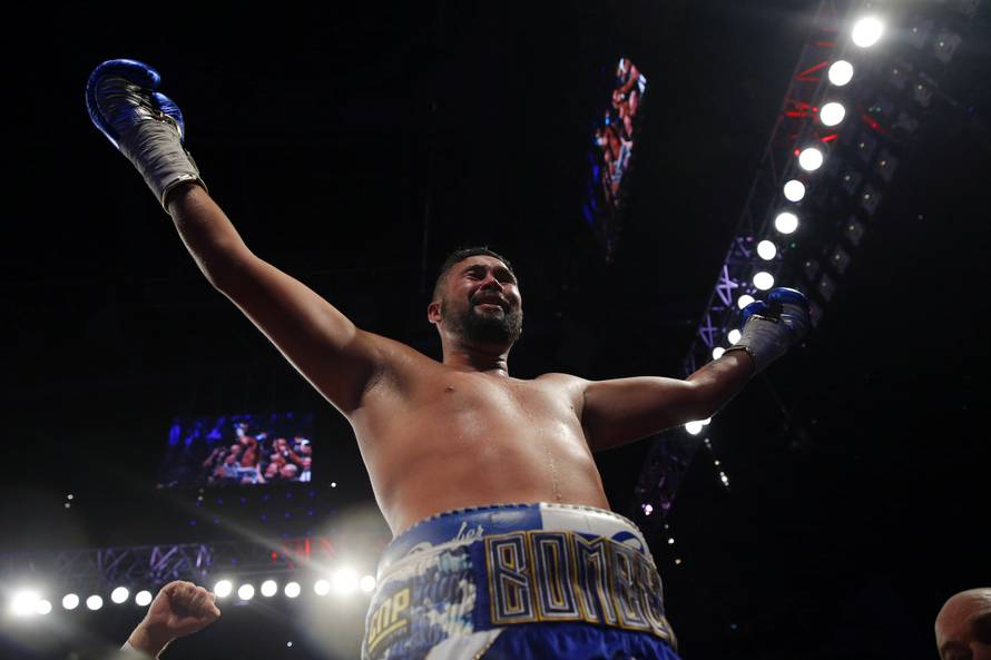 Tony Bellew celebrates winning the fight