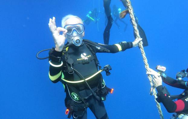 Ray Woolley, diver and World War Two veteran, is seen underwater during an attempt to break a new diving record as he turns 96 by taking the plunge at the Zenobia, a cargo ship wreck off the Cypriot town of Larnaca