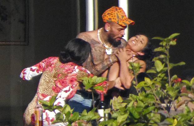 EXCLUSIVE: Chris Brown Puts Hands on Woman