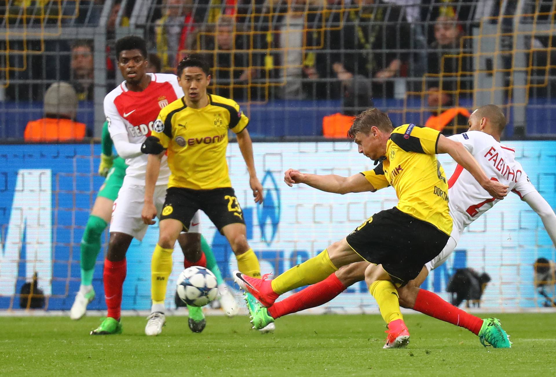 Borussia Dortmund's Lukasz Piszczek shoots at goal