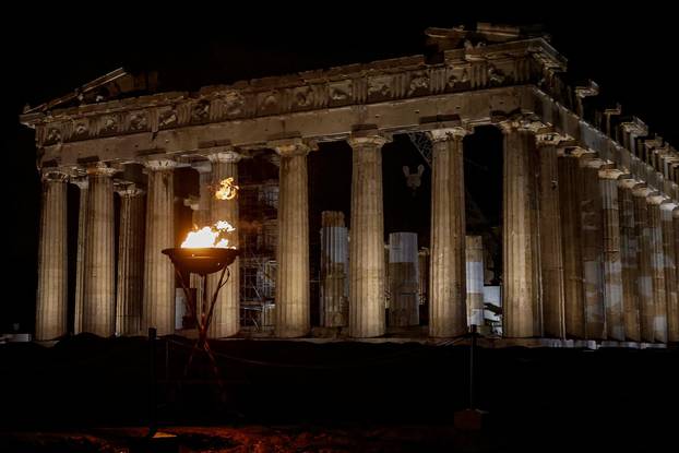 Olympic flame for Paris 2024 arrives at the Acropolis, in Athens