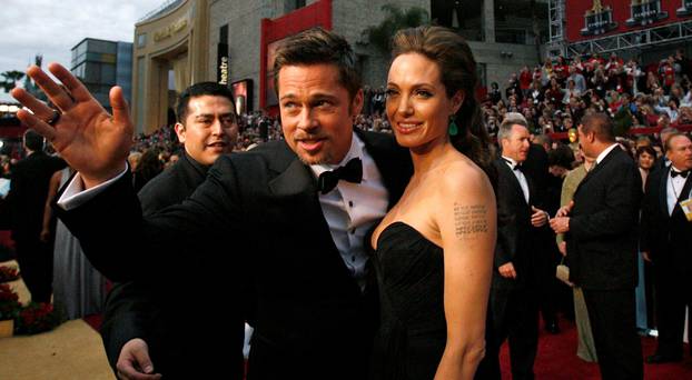 Actors Brad Pitt and Angelina Jolie arrive at the 81st Academy Awards in Hollywood, California