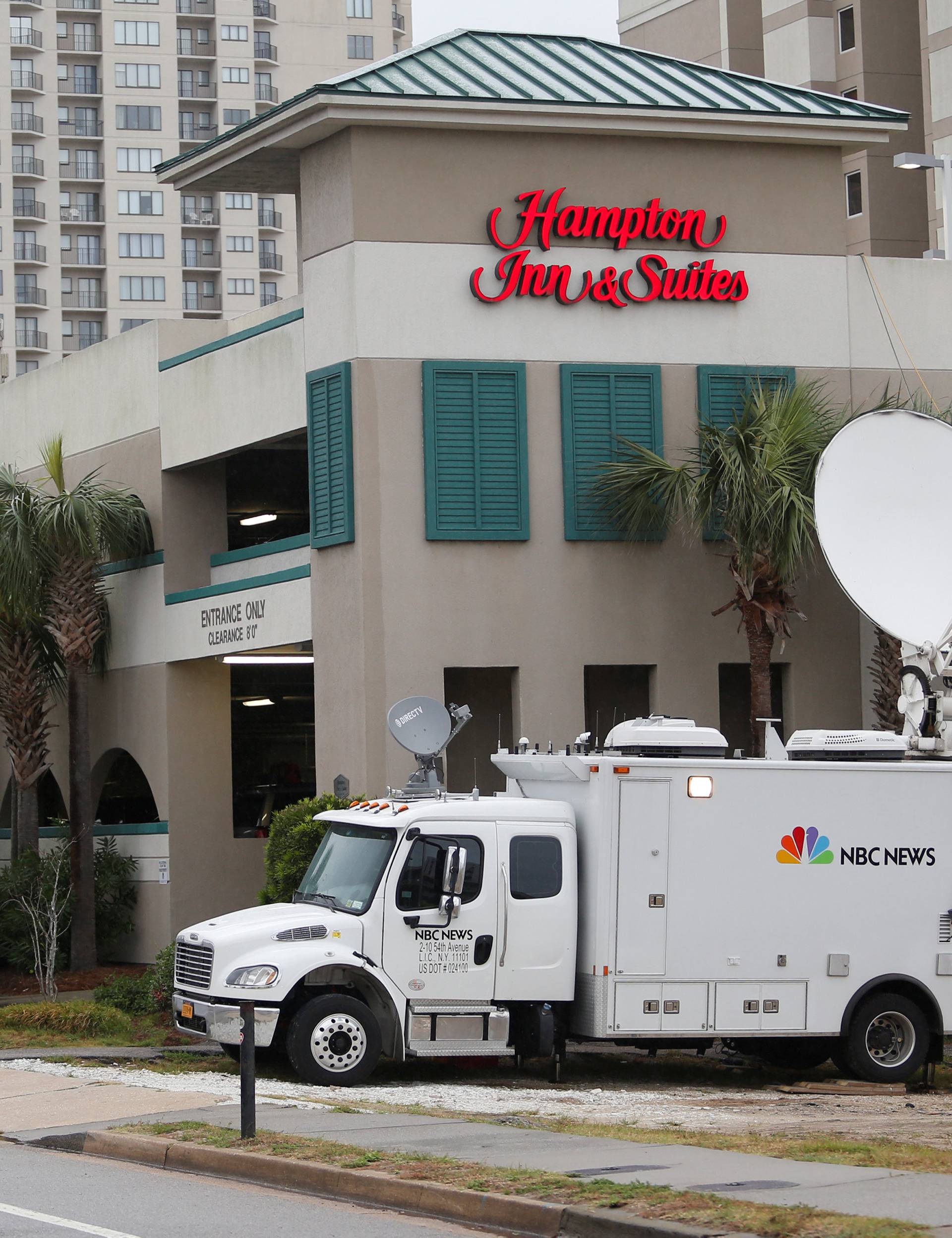 NBC satellite trucks are positioned along Ocean Boulevard during Hurricane Florence in Myrtle Beach