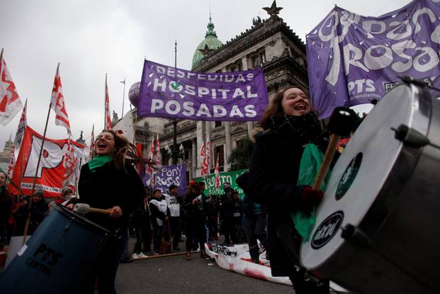 Demonstrators attend a protest in favour of legalising abortion outside the Congress while lawmakers debate an abortion bill in Buenos Aires