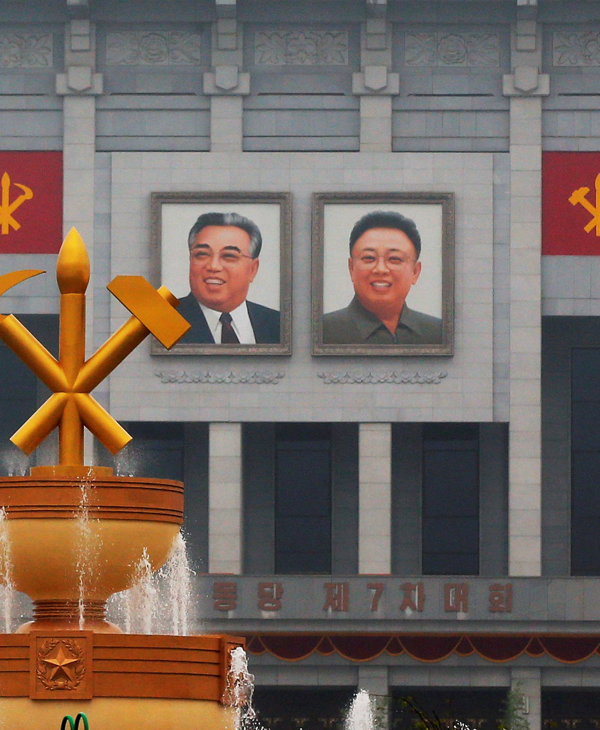 Pictures of former North Korean leaders Kim Il Sung and Kim Jong Il decorate April 25 House of Culture, the venue of Workers' Party of Korea (WPK) congress in Pyongyang