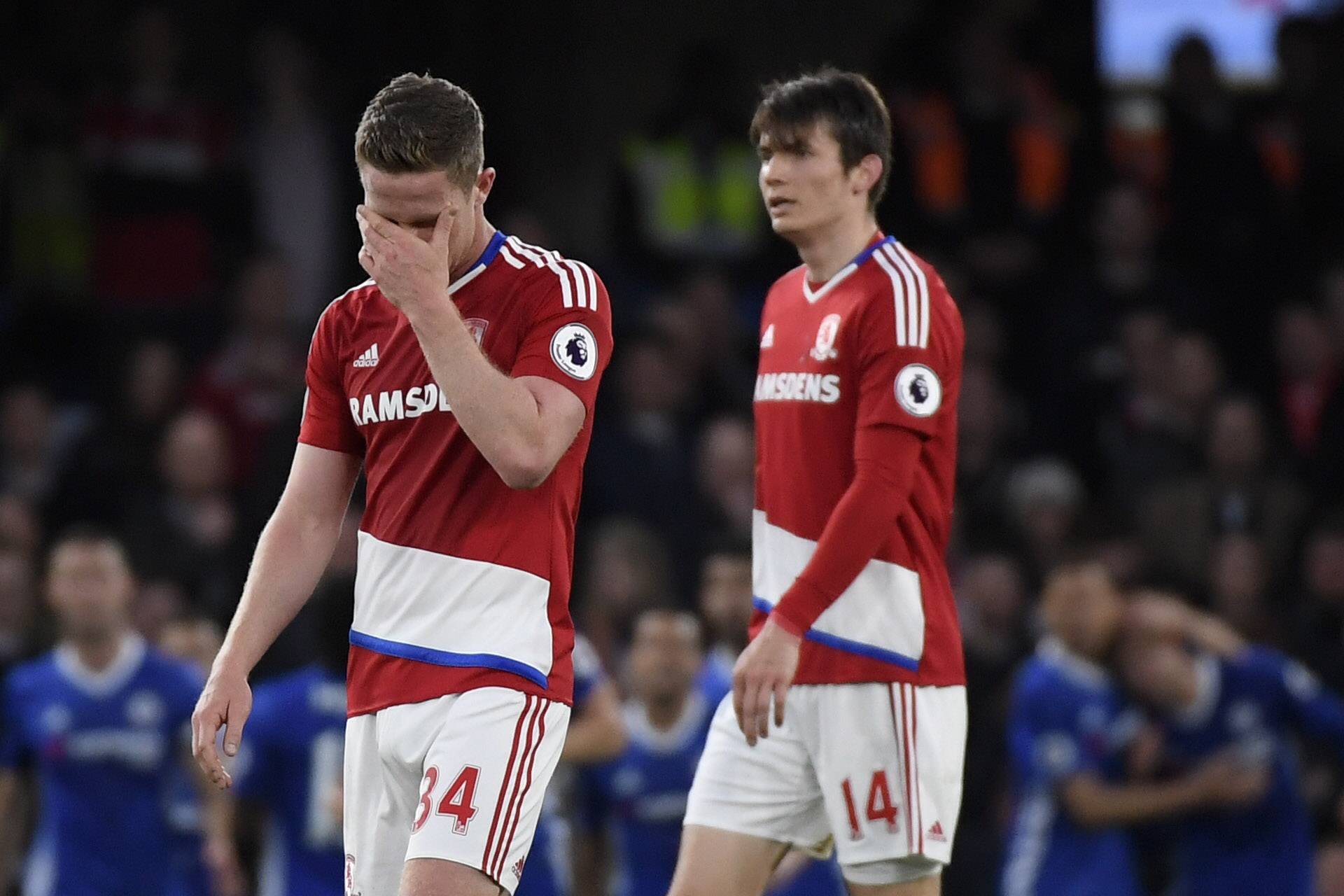 Middlesbrough's Adam Forshaw and Marten de Roon look dejected after Chelsea score their second goal