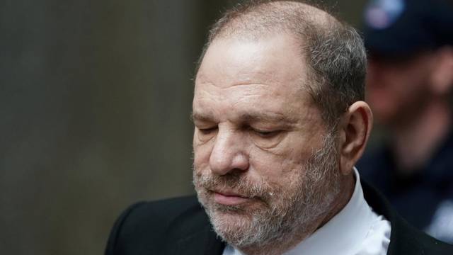 FILE PHOTO: Film producer Harvey Weinstein departs from a court hearing in New York