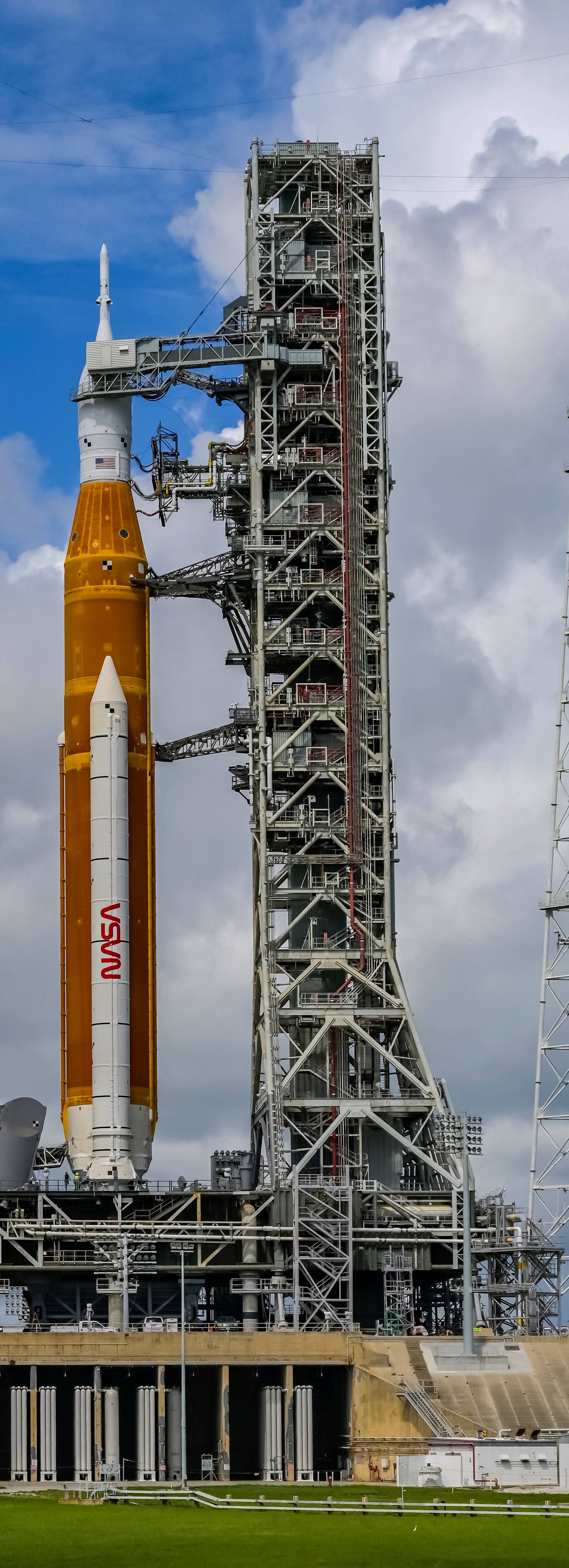 NASA's next-generation moon rocket, the Space Launch System rocket with its Orion crew capsule perched on top, stands on launch pad 39B in preparation for the Artemis 1 mission