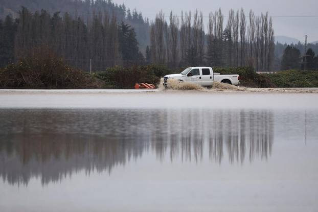 Floodwaters trigger evacuations and highway closures in British Columbia’s Fraser Valley
