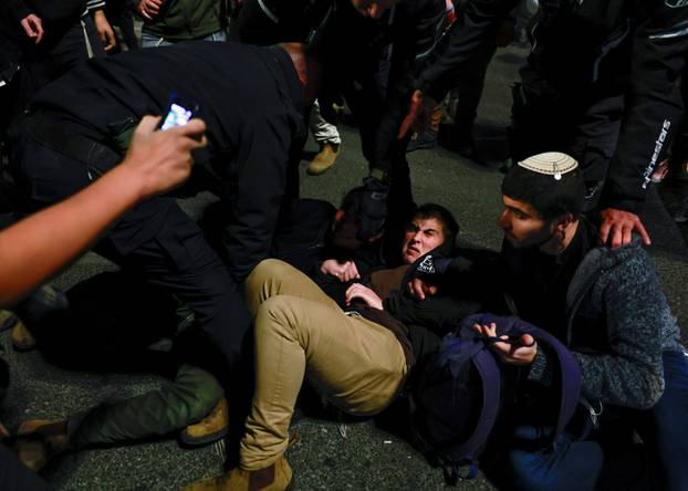 Israelis protest a ceasefire deal, in Jerusalem