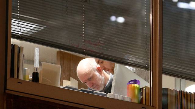 People are seen are seen inside the building which houses the offices of Cambridge Analytica as investigators from Britain's Information Commissioners Office entered, following the granting of a search warrant by a High Court judge, in London