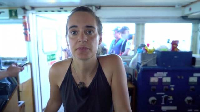 A screen grab taken from a video shows Sea Watch captain Carola Rackete speaking to camera from on board ship near Lampedusa