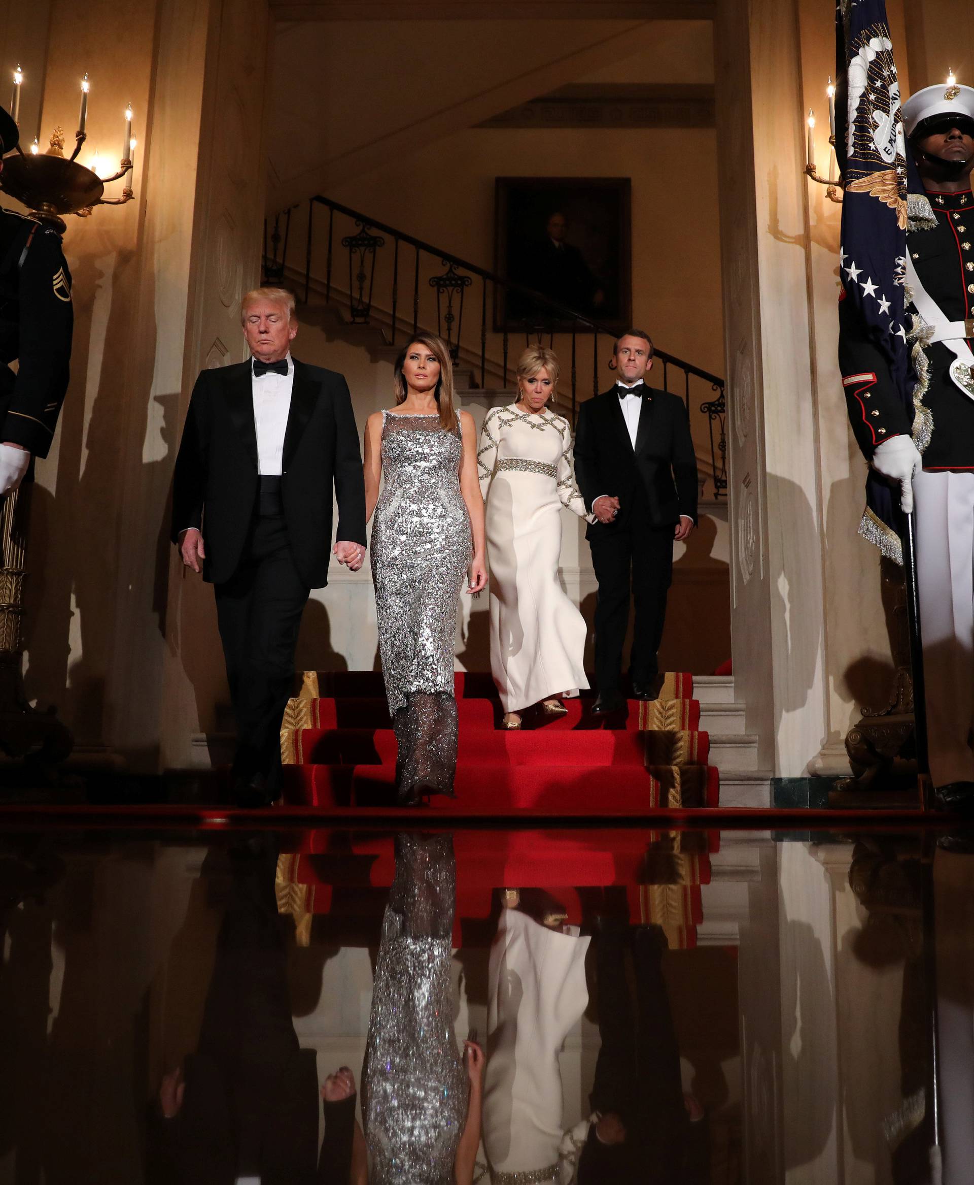 U.S. President Trump, first lady Melania, French President Macron and his wife Brigitte attend a State Dinner at the White House in Washington