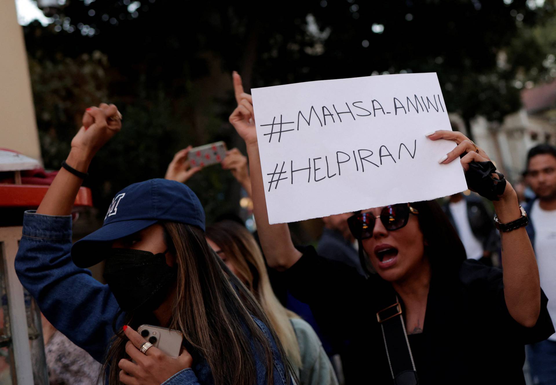 People march in solidarity with women in Iran following the death of Mahsa Amini, in Istanbul