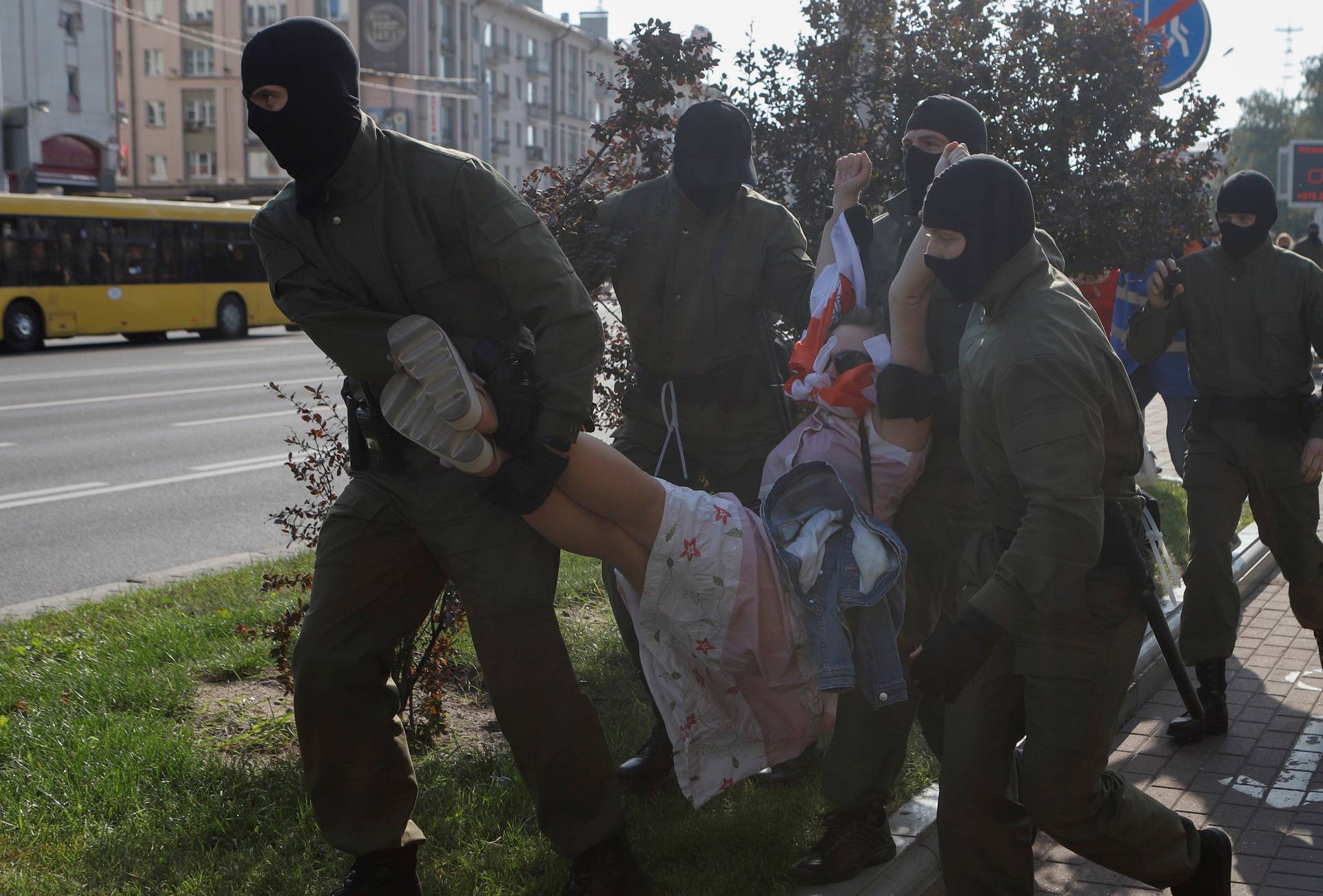 Belarusian opposition supporters hold a rally in Minsk