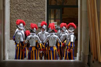 New recruits of the Vaticanâs elite Swiss Guard prepare for the swearing-in ceremony at the Vatican