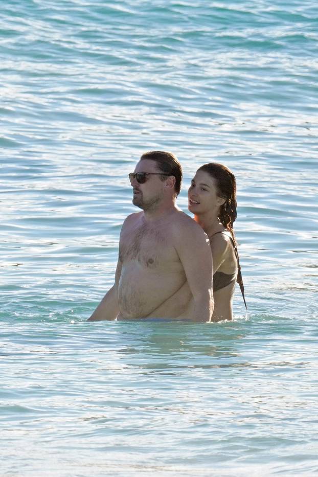 PREMIUM EXCLUSIVE: Leonardo DiCaprio in swim shorts and girlfriend Camila Morrone in a skimpy black bikini enjoy the beach in St Barts