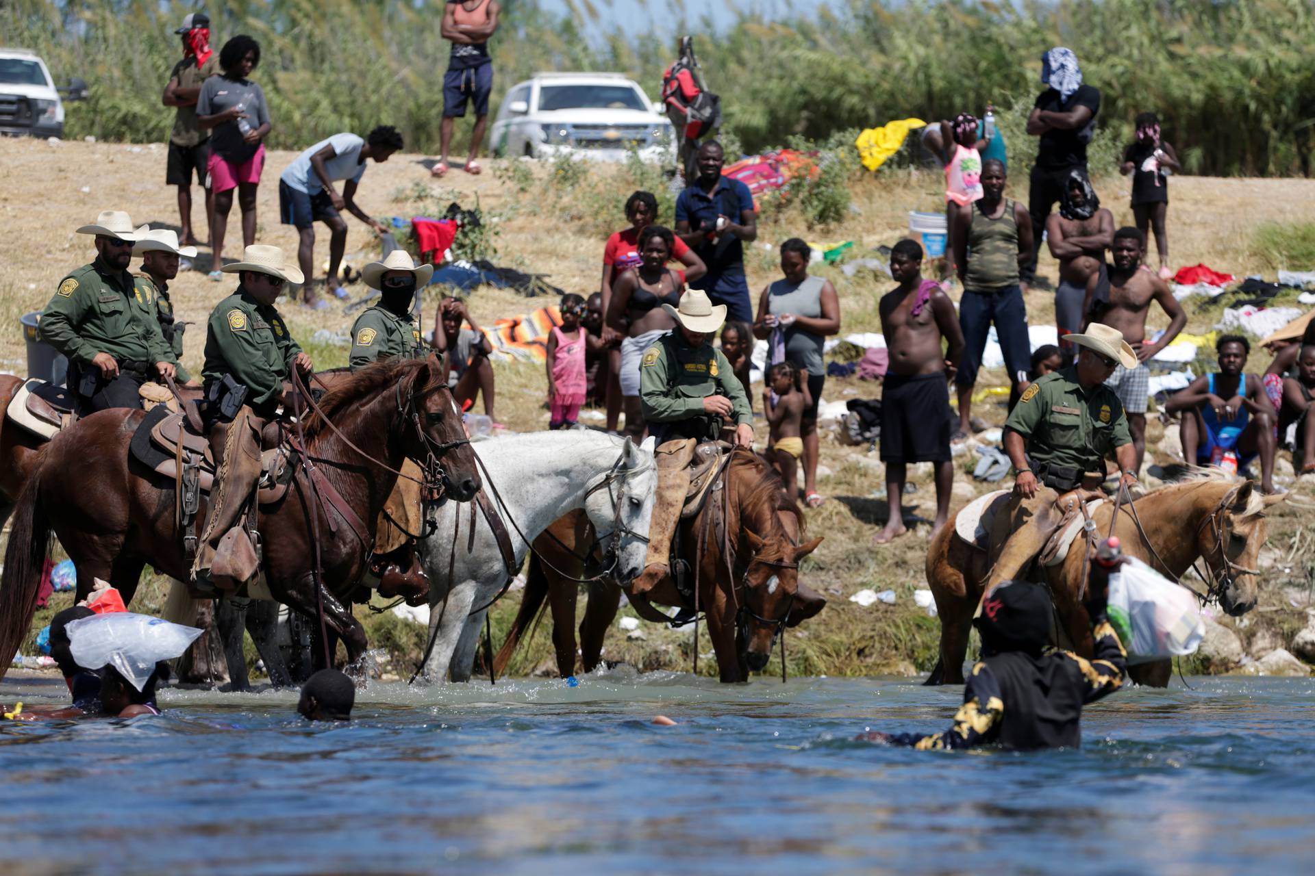 Migrants seeking refuge into the U.S. cross Rio Grande river, in Ciudad Acuna