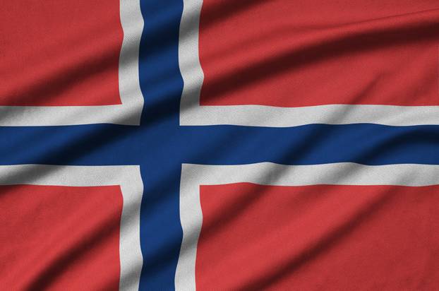 Norway flag  is depicted on a sports cloth fabric with many folds. Sport team banner