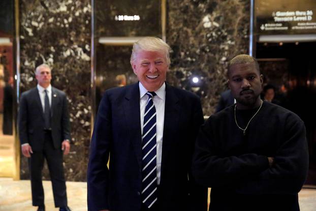 U.S. President-elect Donald Trump and musician Kanye West pose for media at Trump Tower in Manhattan, New York City